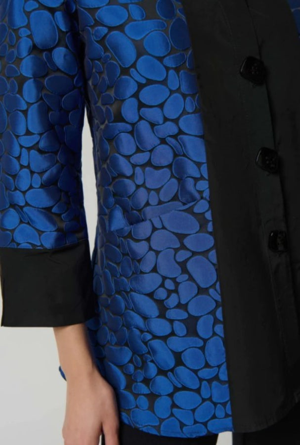 Blue textured coat with black buttons on a white background