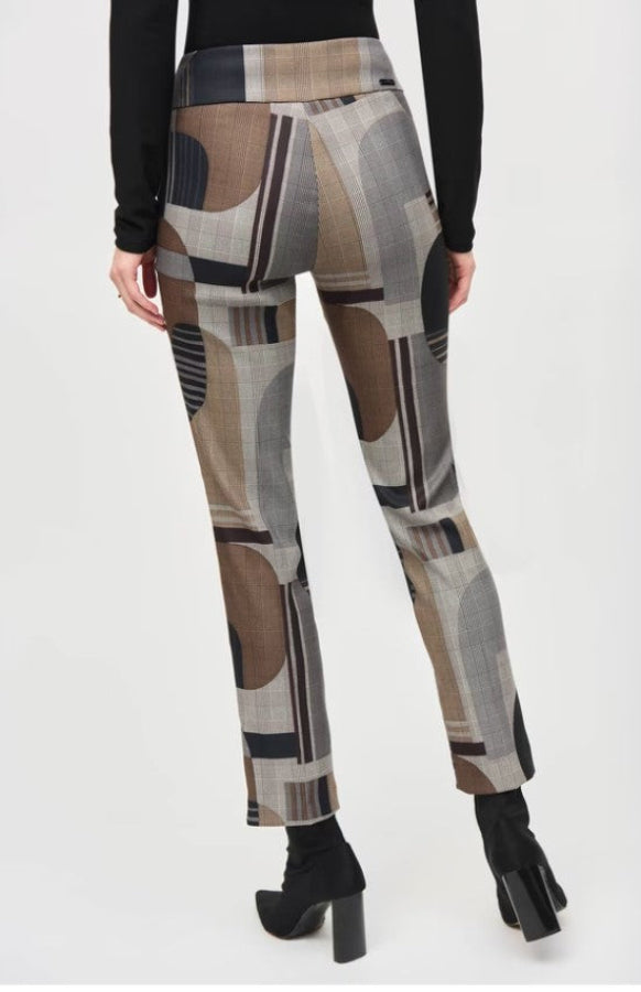 Patterned pants worn by a person on a white background