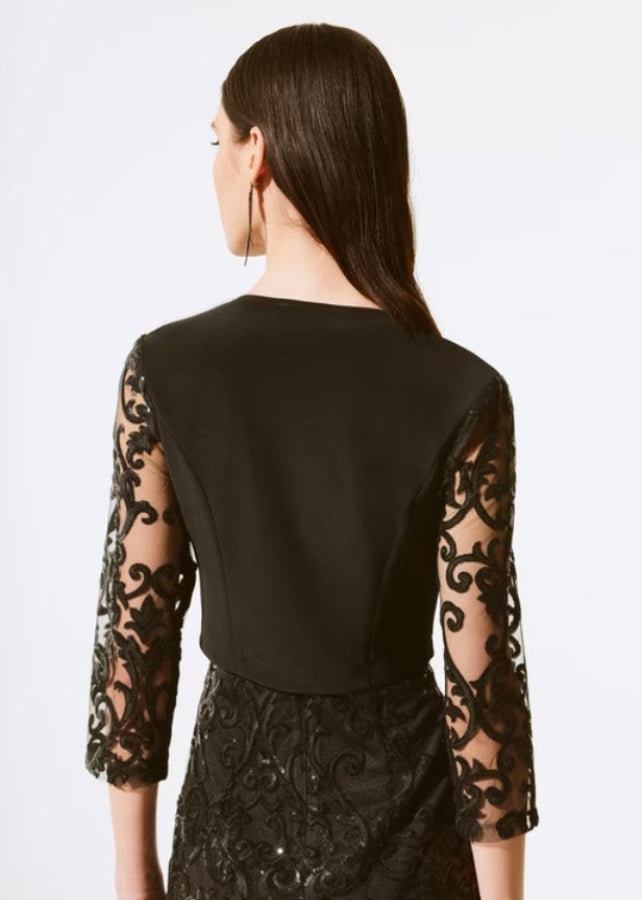 Black lace bolero on a white background