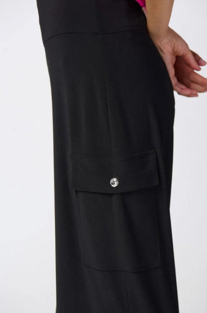 Black pants with a pocket and button detail on a white background