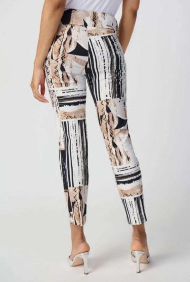 Patterned pants worn by a person on a white background