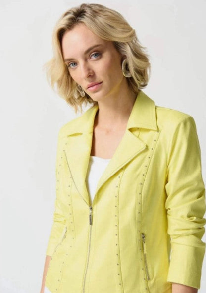 Woman wearing a yellow jacket on a white background